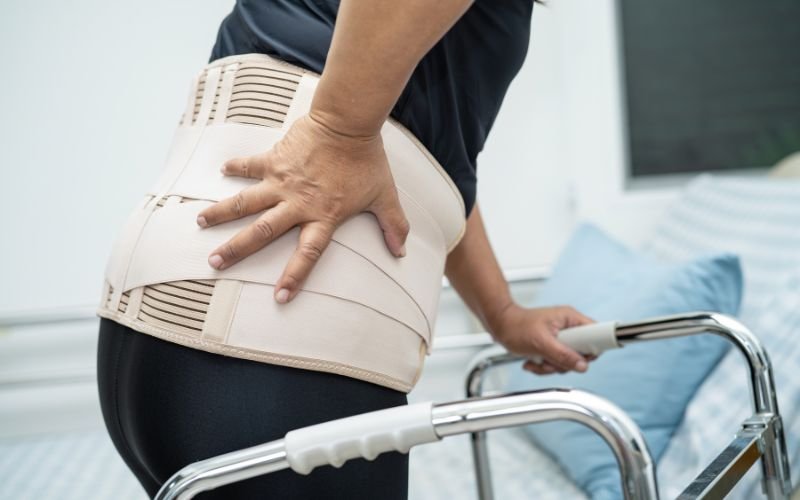 Breathable medical grade fabric on lumbar back support brace for hot climates